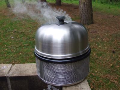 The Cobb Premier Ultimate Barbecue Cooking System.